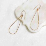 Lightweight teardrop shaped earrings with hammered finish in gold fill or sterling silver.