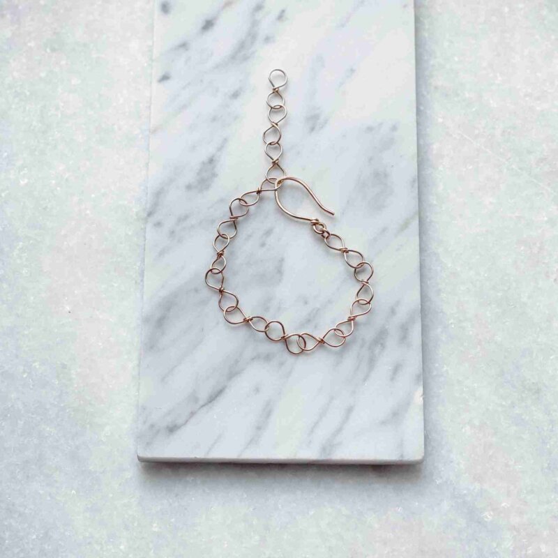 Infinity Bracelet in 14k Gold Filled or Sterling Silver with adjustable hook closure, up to 9 inches long.