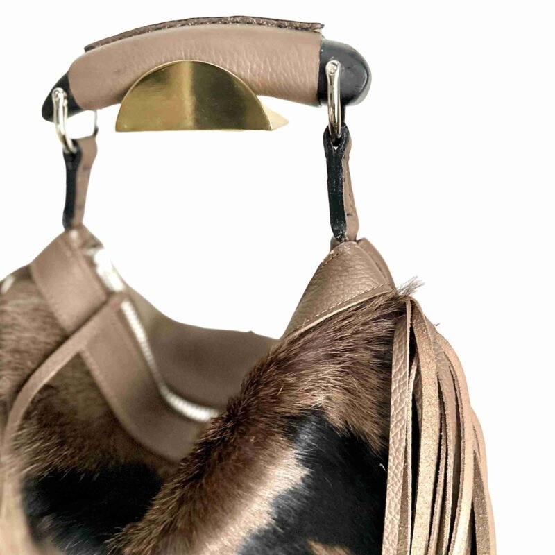 Cavallino calfskin bag in brown and black with leather-wrapped handle.