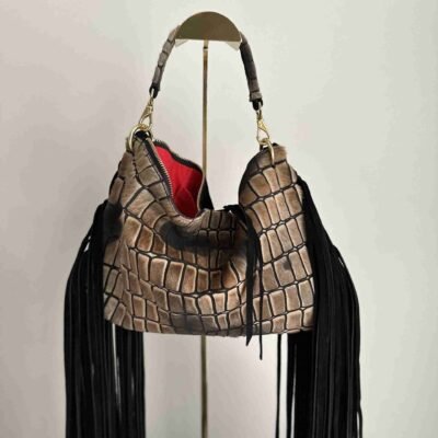 Jewell bag in black and taupe/grey hair-on-hide with long fringe.
