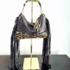 Dominique black leather bag with animal print and long fringe.