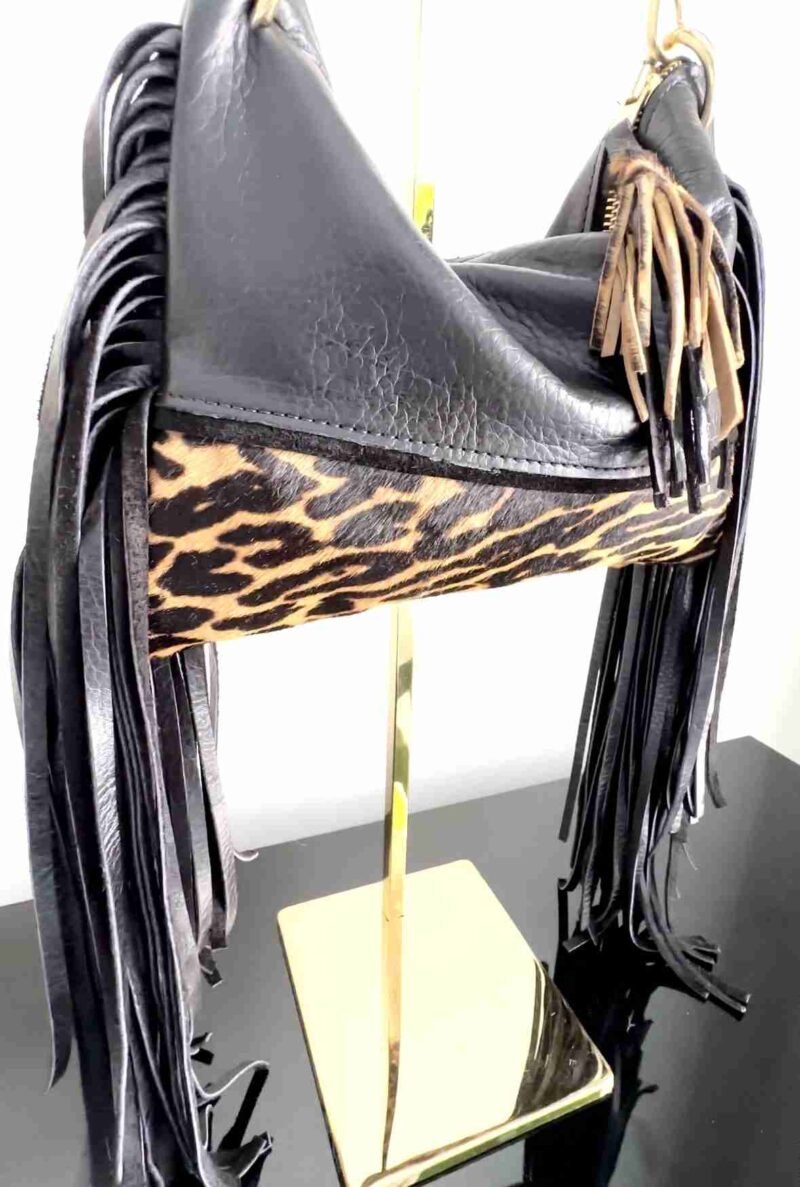 Dominique black leather bag with animal print and long fringe.