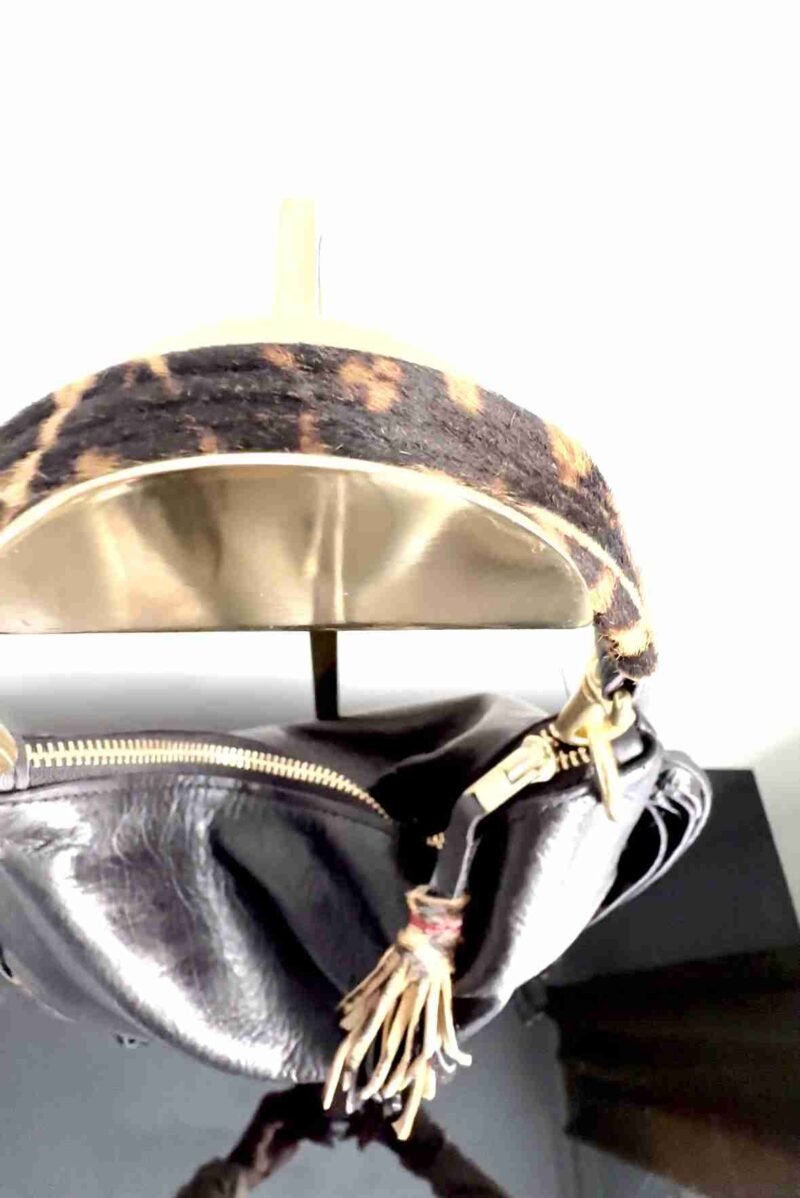 Dominique black leather bag with animal print and long fringe.