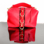 Marcel Red Leather Handbag with Spikes and Hair-on-Hide Accent