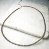 Jovie Necklace crafted with hematite beads and 14K gold-filled extension, adjustable to 23 inches with lobster clasp closure.