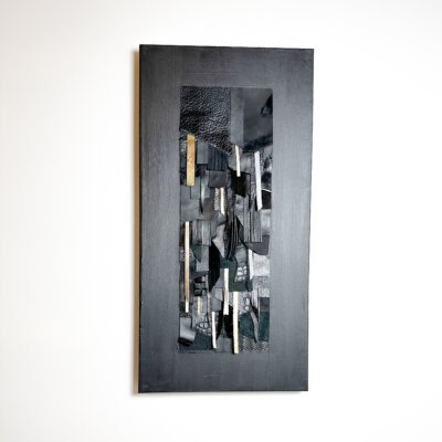 Abstract wall art made from black and textured leather on canvas