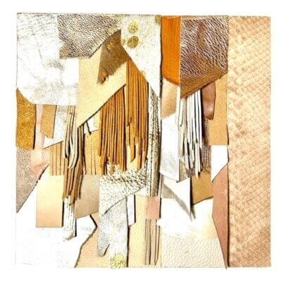 Abstract leather wall art in neutral and gold tones on wood base