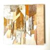 Abstract leather wall art in neutral and gold tones on wood base